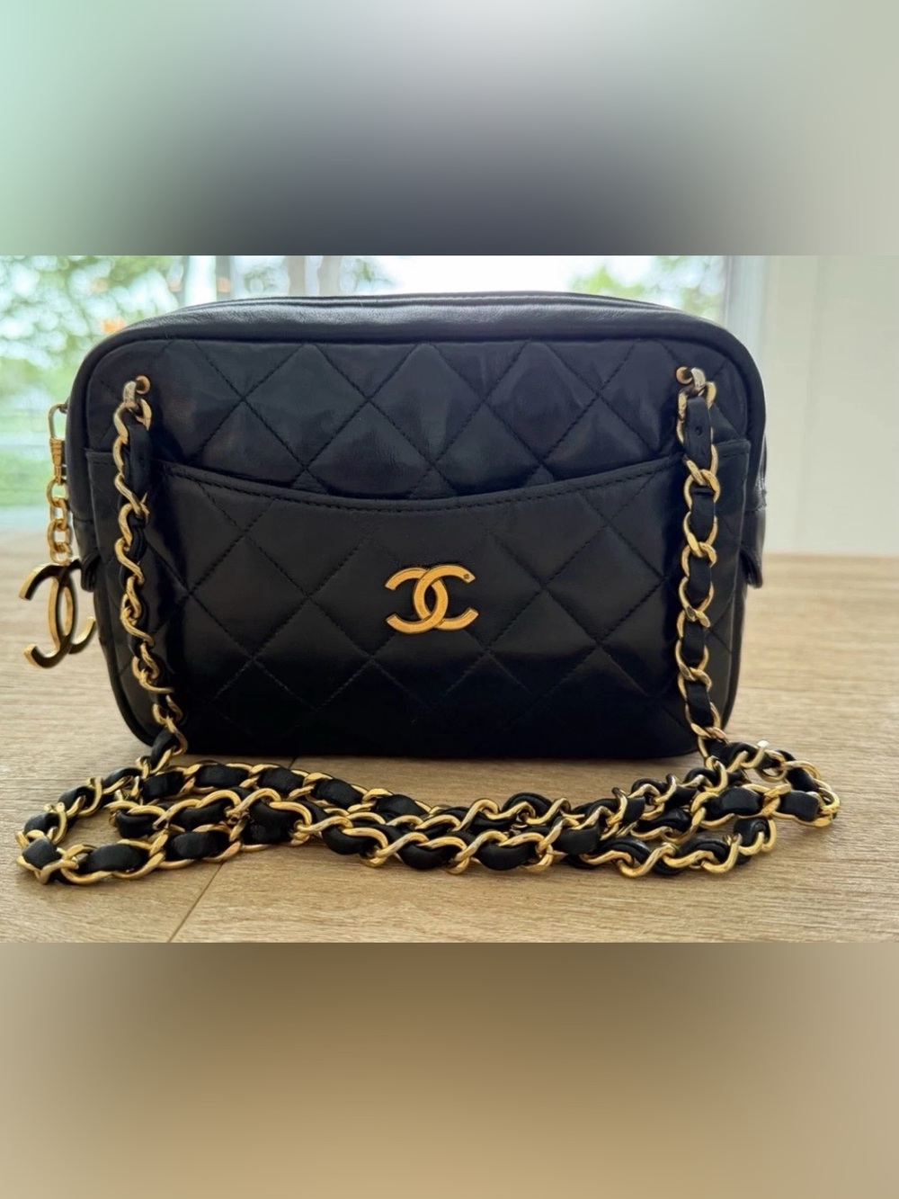 CHANEL Black Quilted Shoulder Bag with Gold CC and Chain